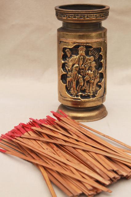 vintage Chinese fortune telling sticks in Chinatown style vase Confucius wise man