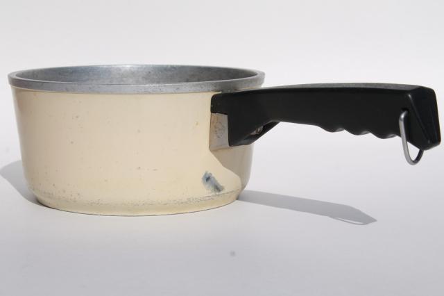 vintage Club aluminum cookware, ivory color dutch oven pot and sauce pans