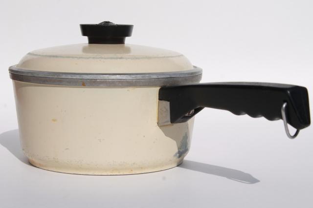 vintage Club aluminum cookware, ivory color dutch oven pot and sauce pans