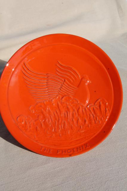 vintage Frankoma pottery plates in flame orange red glaze, Phoenix bird rising from ashes