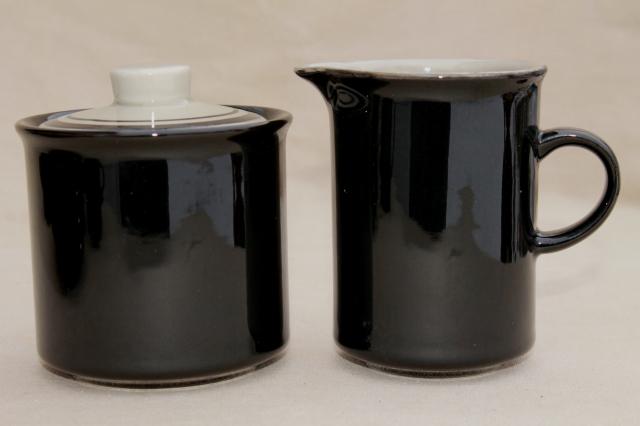 vintage Japan stoneware dishes, ceramic coffee mug cups & saucers, glossy black & tan pottery