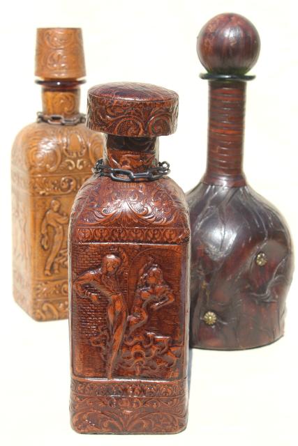 vintage Spanish & Italian leather covered decanter bottles, medieval renaissance gothic style