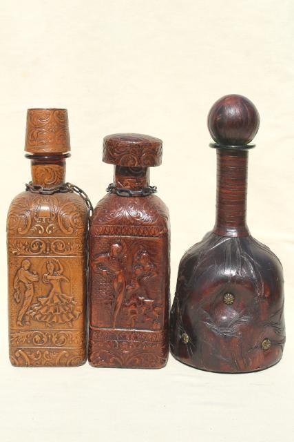 vintage Spanish & Italian leather covered decanter bottles, medieval renaissance gothic style
