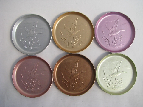 Vintage anodized colored aluminum coasters, wrought game birds design