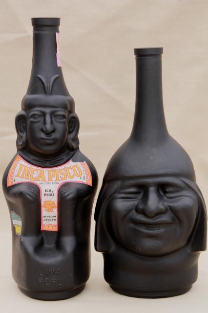 vintage black glass Inca Pisco bottles, tiki style indian heads & totem