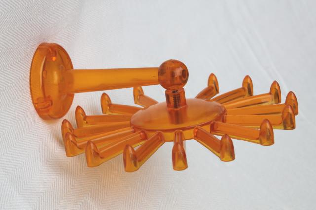 vintage butterscotch plastic wheel hanging rack, scarf or necklace holder for closet / jewelry storage