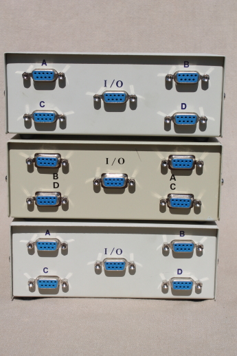 Vintage computer data transfer switches for Sub D 9 pin ports, lot of 3 switches w/ 4 ports each