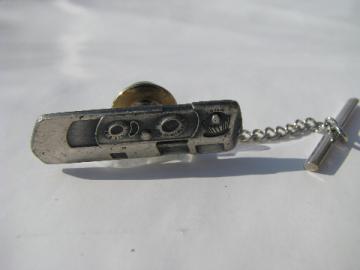 Vintage figural tie pin of a early hand held transistor radio.