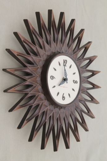 Vintage General Electric wall clock, mod sunburst rays plastic clock frame