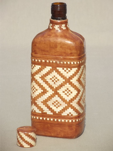 Vintage leather covered decanter, glass liquor bottle w/ leatherwork