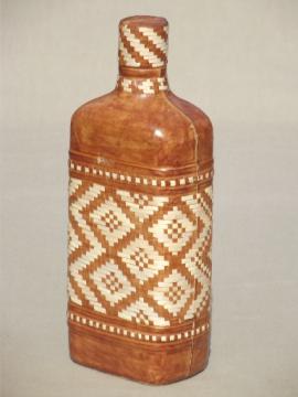 Vintage leather covered decanter, glass liquor bottle w/ leatherwork