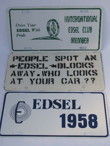Vintage metal collector's car sign lot, old Edsel auto advertising signs