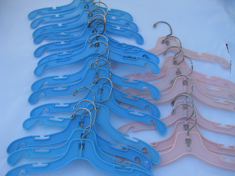 Vintage pink & blue plastic baby hangers for infant or doll clothes