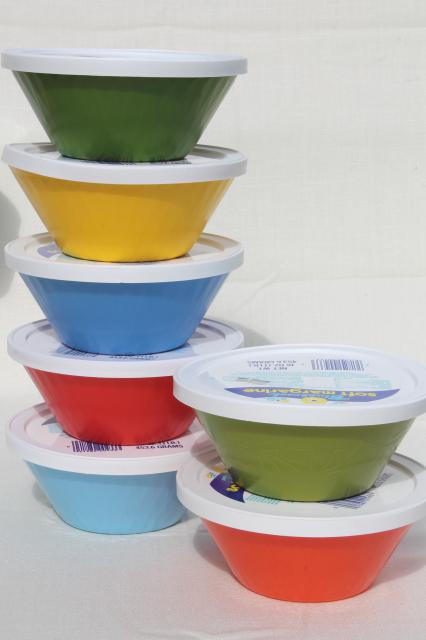 vintage plastic margarine tubs, bowls in bright primary colors for picnic dishes or fridge containers