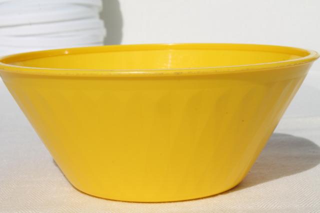 vintage plastic margarine tubs, bowls in bright primary colors for picnic dishes or fridge containers