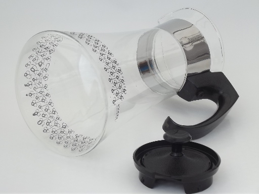 Vintage Pyrex glass coffee carafe in mod black print w/ warmer stand