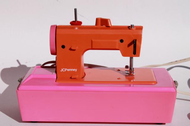 vintage toy sewing machine retro pink & orange plastic case, not working nice for parts or display