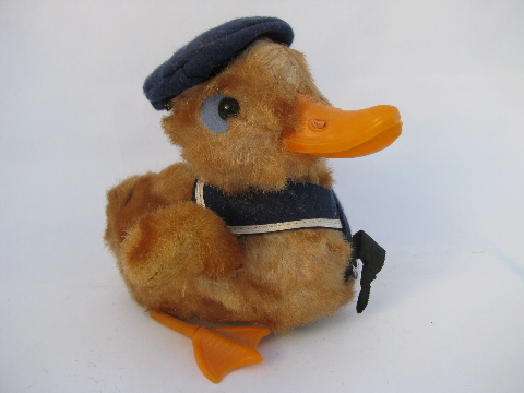 Vintage wind-up toy, waddling duck in sailor suit, cute for Easter!