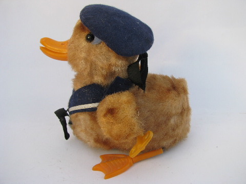 Vintage wind-up toy, waddling duck in sailor suit, cute for Easter!