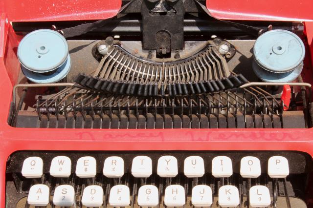 working toy typewriter, vintage Tom Thumb President typewriter in candy apple red